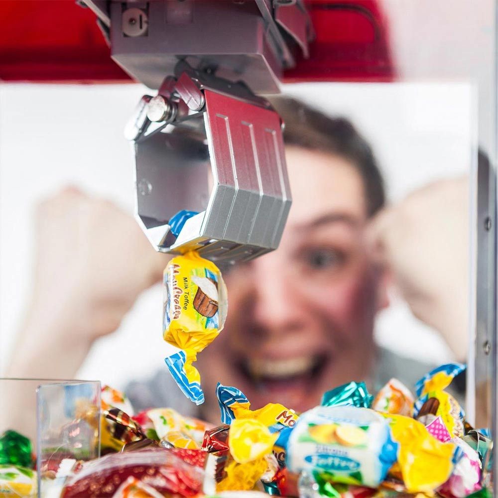 احصل على موزع حلوى أو آلة لعبة للاستيلاء على الحلويات أو الحلوى